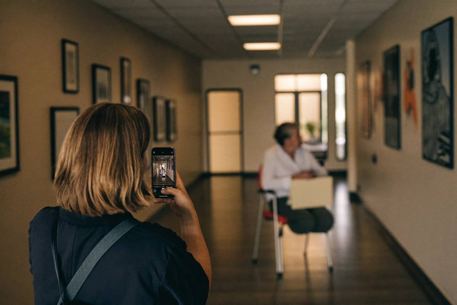 Advisor sharing tour photos by phone with a distant family